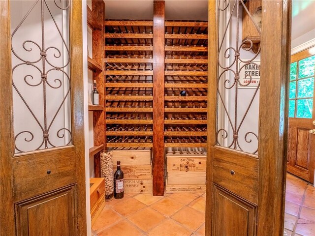 wine room with light tile patterned floors