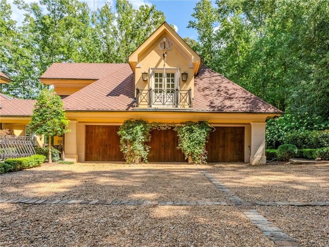 view of front of property with a garage