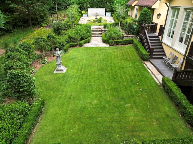 view of yard with a deck