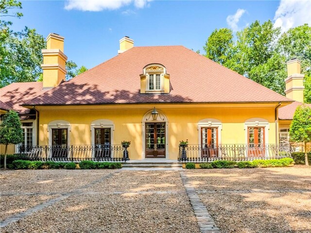 exterior space featuring french doors and a porch