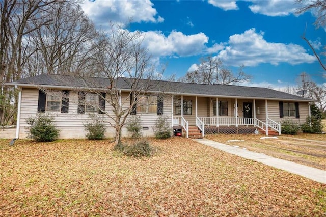 single story home with a porch and a front yard