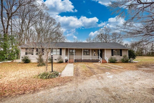 ranch-style home with covered porch