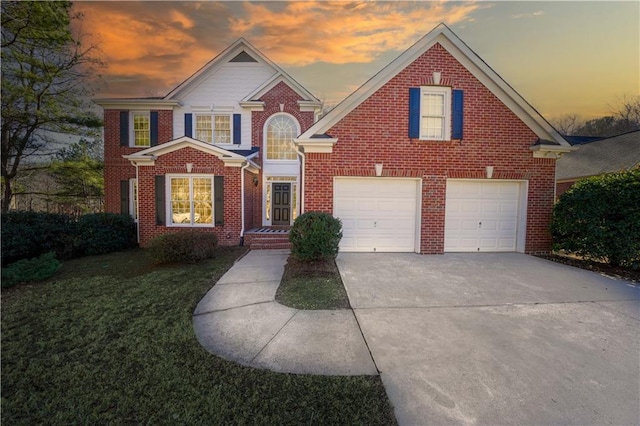 front of property with a garage