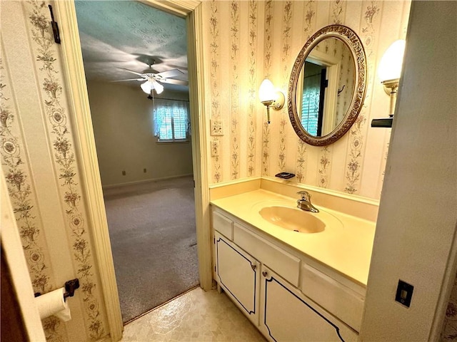 10 Montre Cir, Silver Creek, GA 30173 - bathroom with vanity, a ceiling fan, and wallpapered walls