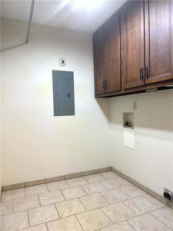 10 Montre Cir, Silver Creek, GA 30173 - laundry room with electric panel, cabinet space, washer hookup, and light tile patterned flooring