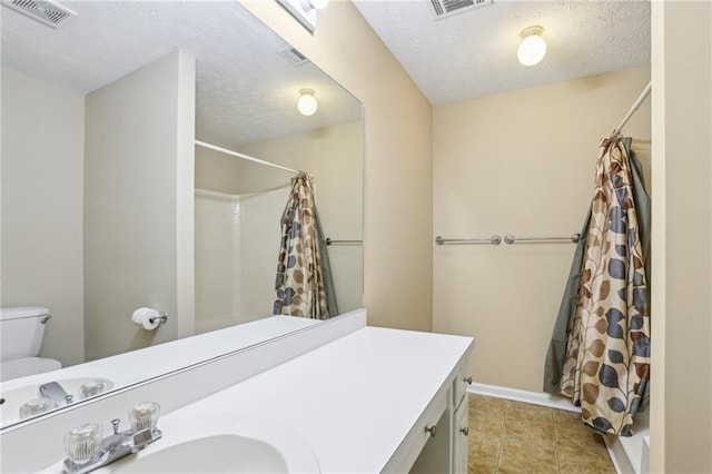 1039 Megan Ct, Sugar Hill, GA 30518 - bathroom with vanity, toilet, a textured ceiling, shower / bathtub combination with curtain, and tile patterned flooring