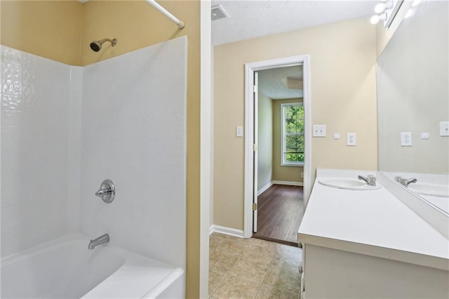 1039 Megan Ct, Sugar Hill, GA 30518 - full bath with shower / tub combination, vanity, tile patterned flooring, and baseboards