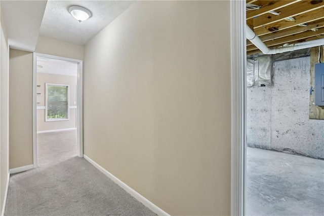 1039 Megan Ct, Sugar Hill, GA 30518 - hallway featuring baseboards, carpet flooring, and electric panel