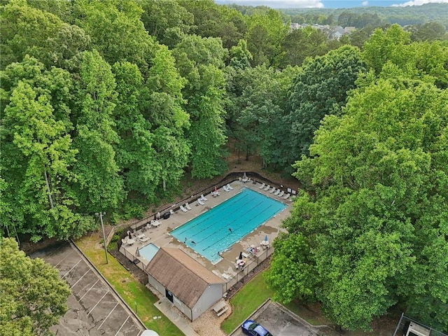 1039 Megan Ct, Sugar Hill, GA 30518 - bird's eye view of a heavily wooded area and a pool area