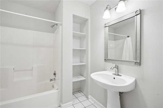 bathroom featuring shower / bathtub combination with curtain and tile patterned flooring