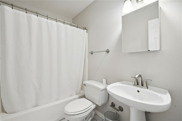 bathroom with sink and toilet