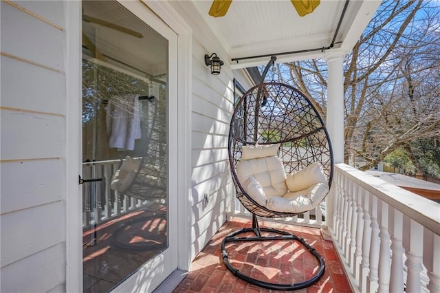 balcony featuring a sunroom