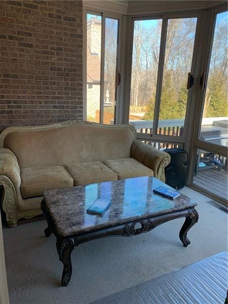 sunroom featuring a wealth of natural light