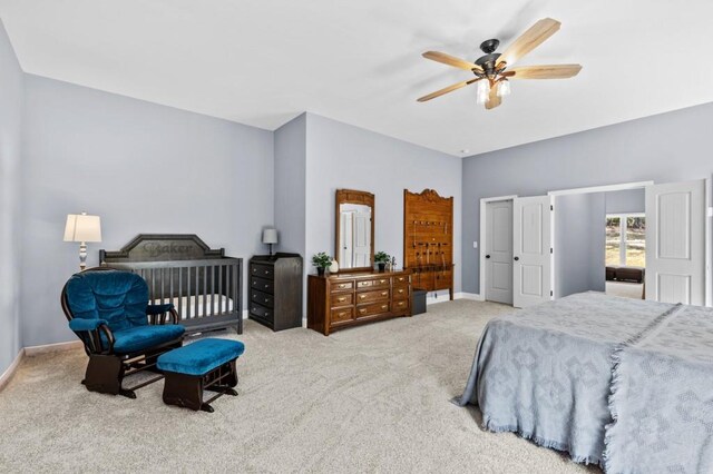 bedroom with ceiling fan and carpet floors