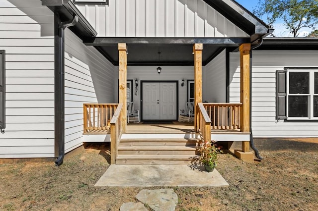 property entrance with covered porch