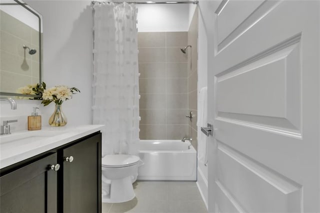 full bathroom with vanity, toilet, tile patterned flooring, and shower / bath combo