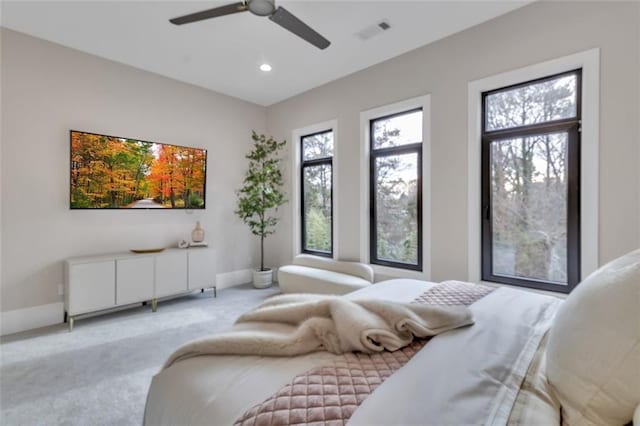 carpeted bedroom featuring ceiling fan