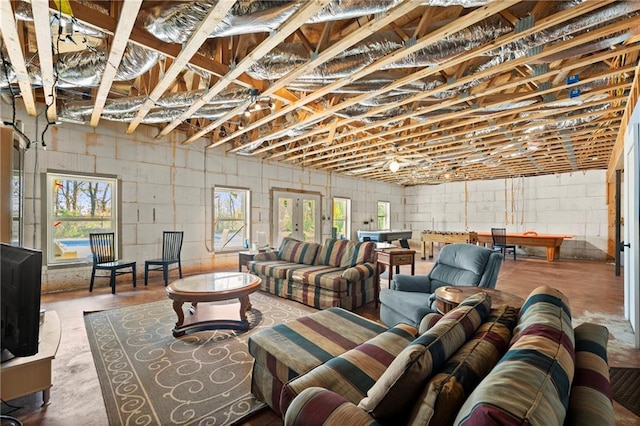 living room with concrete flooring