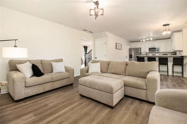 living room with hardwood / wood-style flooring