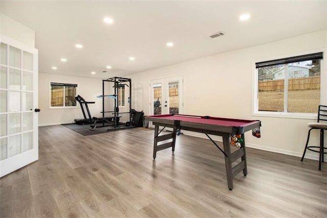 recreation room featuring french doors, billiards, and hardwood / wood-style flooring