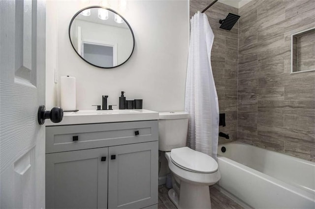 full bathroom featuring shower / bathtub combination with curtain, vanity, wood-type flooring, and toilet