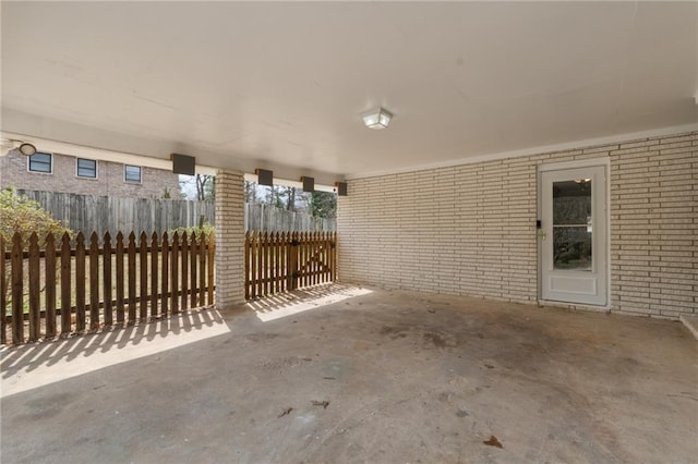 view of patio featuring fence