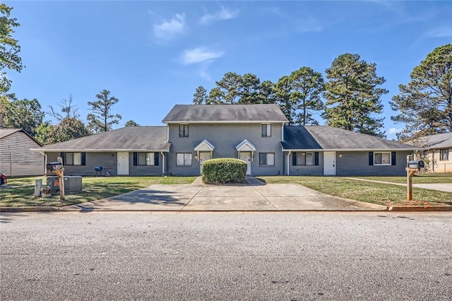 2638 Fieldstone View Ln SE, Conyers, GA 30013 - traditional-style home featuring a front lawn