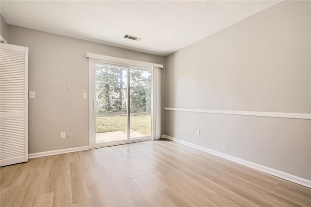 2638 Fieldstone View Ln SE, Conyers, GA 30013 - empty room with light wood-style floors and baseboards