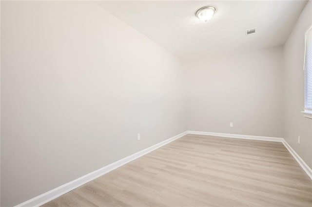2638 Fieldstone View Ln SE, Conyers, GA 30013 - unfurnished room with light wood-type flooring and baseboards