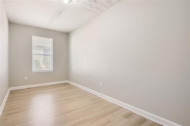 2638 Fieldstone View Ln SE, Conyers, GA 30013 - unfurnished room featuring light wood finished floors and baseboards