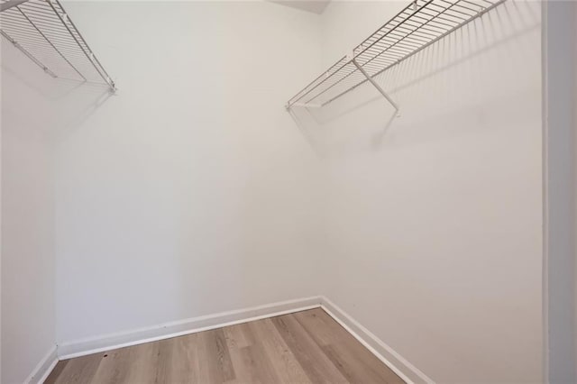 2638 Fieldstone View Ln SE, Conyers, GA 30013 - spacious closet with wood finished floors