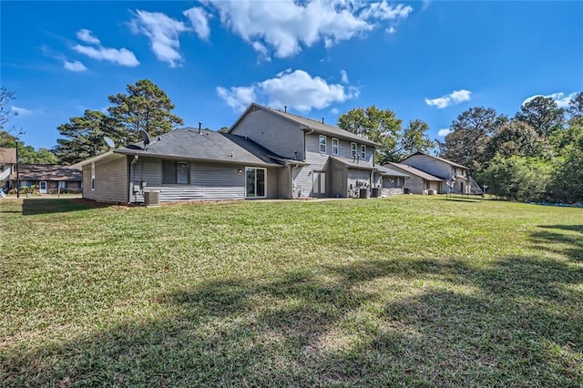 2638 Fieldstone View Ln SE, Conyers, GA 30013 - rear view of property with a lawn