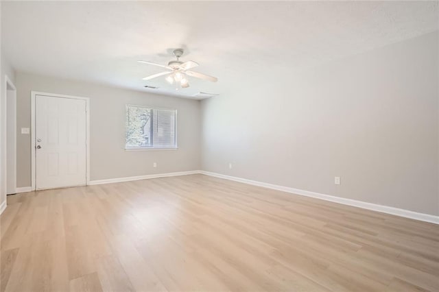 2638 Fieldstone View Ln SE, Conyers, GA 30013 - spare room with light wood-type flooring and ceiling fan