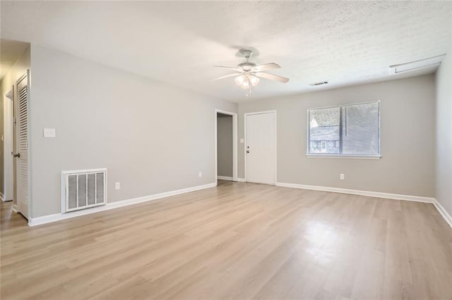 2638 Fieldstone View Ln SE, Conyers, GA 30013 - empty room with light wood-style flooring and a ceiling fan
