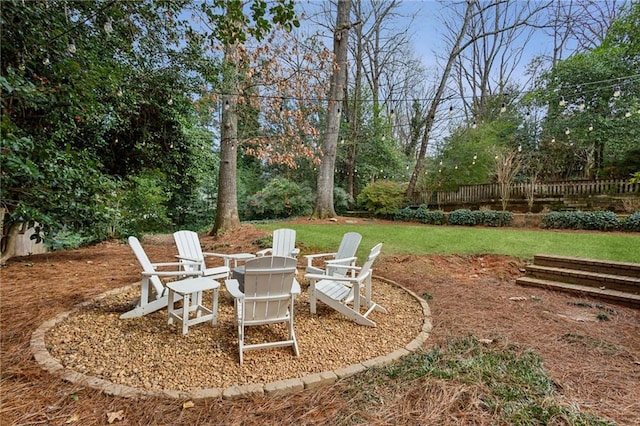 view of yard featuring a fire pit