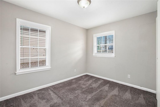 empty room featuring carpet flooring