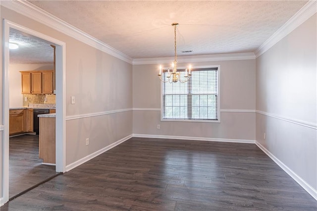 1241 Hogan Ridge Ct, Grayson, GA 30017 - unfurnished dining area with a chandelier, dark wood-style floors, a textured ceiling, crown molding, and baseboards