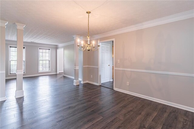 1241 Hogan Ridge Ct, Grayson, GA 30017 - unfurnished room with a chandelier, dark wood finished floors, crown molding, and baseboards