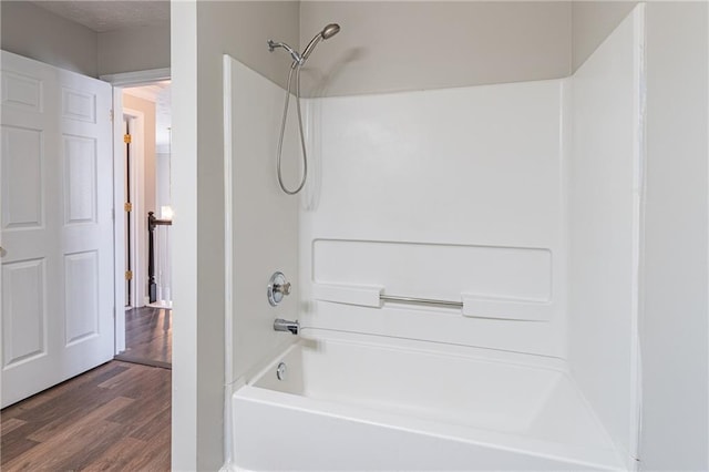 1241 Hogan Ridge Ct, Grayson, GA 30017 - full bathroom with bathtub / shower combination and wood finished floors