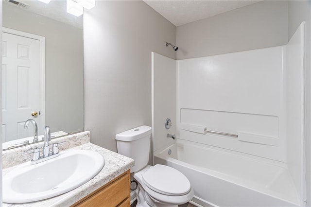 1241 Hogan Ridge Ct, Grayson, GA 30017 - full bathroom featuring vanity, tub / shower combination, toilet, and a textured ceiling