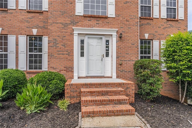 1241 Hogan Ridge Ct, Grayson, GA 30017 - doorway to property with brick siding