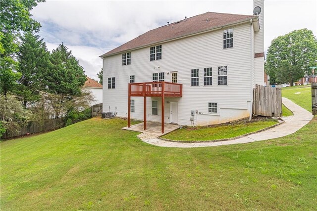 1241 Hogan Ridge Ct, Grayson, GA 30017 - rear view of house with a chimney, a wooden deck, a patio area, and cooling unit