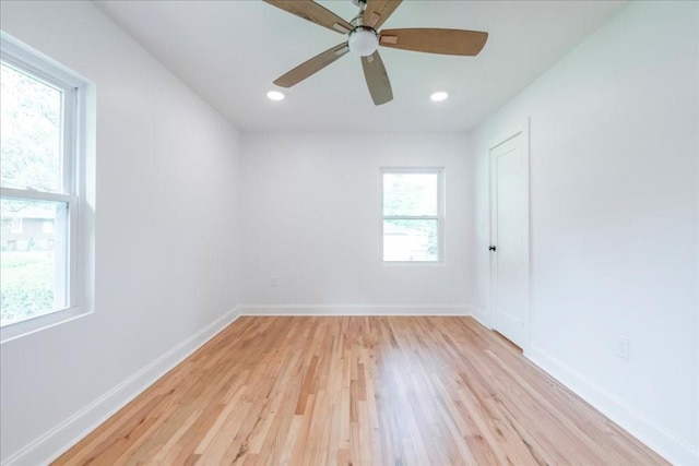 unfurnished room with light hardwood / wood-style floors