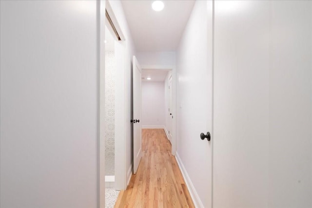 hallway featuring light hardwood / wood-style flooring