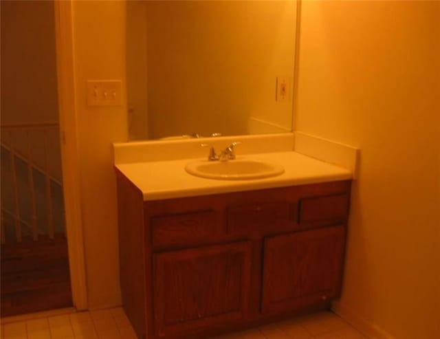 bathroom with vanity and tile patterned floors