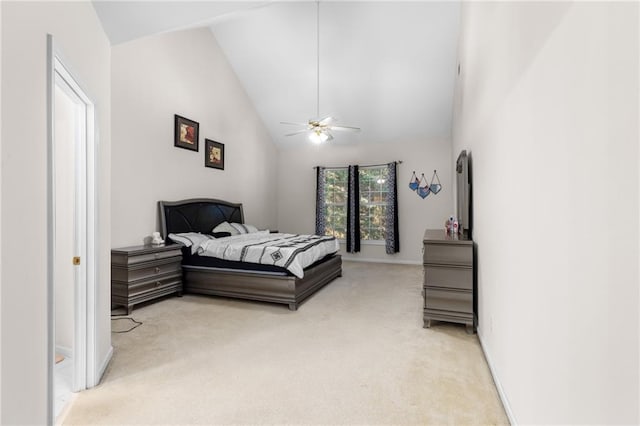 bedroom featuring light colored carpet, high vaulted ceiling, and ceiling fan