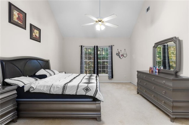 carpeted bedroom with multiple windows, high vaulted ceiling, and ceiling fan