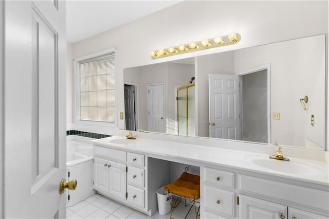 bathroom with vanity, tile patterned floors, and separate shower and tub