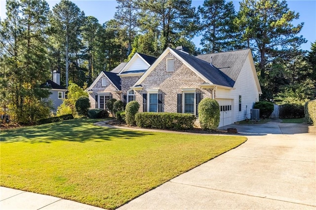 view of front of property with central AC, a garage, and a front lawn