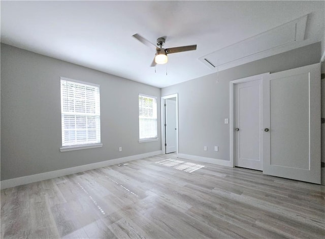 unfurnished bedroom featuring ceiling fan and light hardwood / wood-style floors